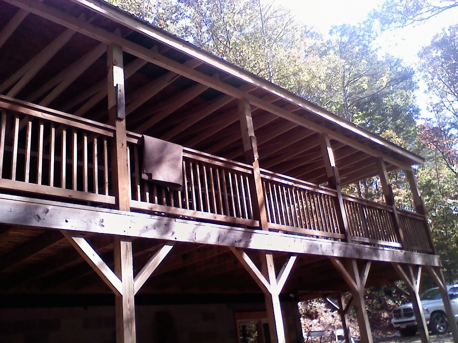 Timber framing under a new elevated porch and deck — Roof Leak Repair in Grosse Ile by Roofing Brothers
